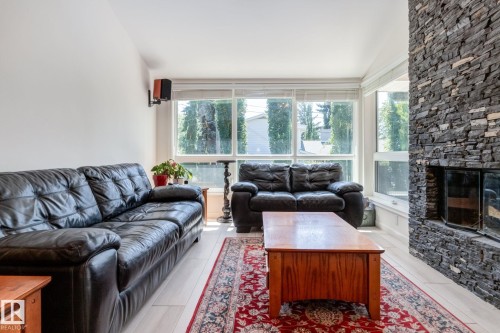 9728 141 Street, Edmonton, AB - Indoor Photo Showing Living Room With Fireplace