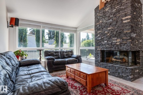 9728 141 Street, Edmonton, AB - Indoor Photo Showing Living Room With Fireplace