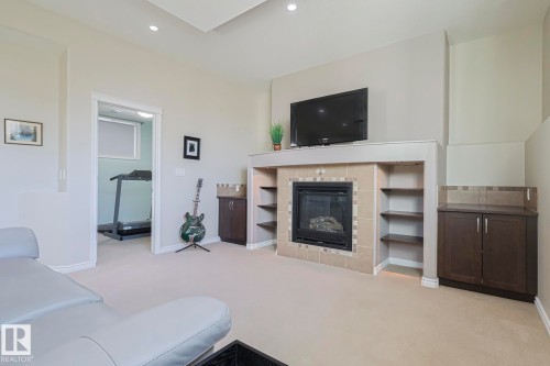 5601 Rue Eaglemont, Beaumont, AB - Indoor With Fireplace