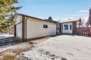 The property features a front yard with a driveway, an attached garage, and a bay window - 18923 86A Avenue, Edmonton, AB  - Outdoor 