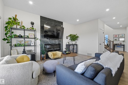 6076 180 Avenue, Edmonton, AB - Indoor Photo Showing Living Room With Fireplace