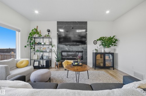 6076 180 Avenue, Edmonton, AB - Indoor Photo Showing Living Room With Fireplace