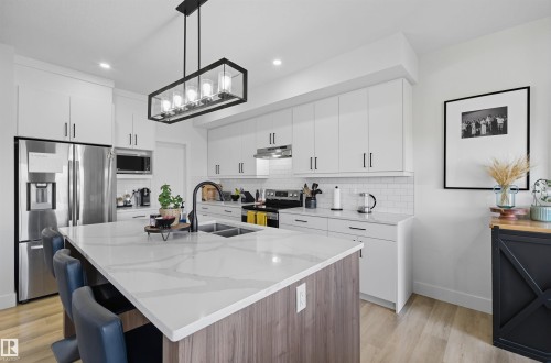 6076 180 Avenue, Edmonton, AB - Indoor Photo Showing Kitchen With Double Sink