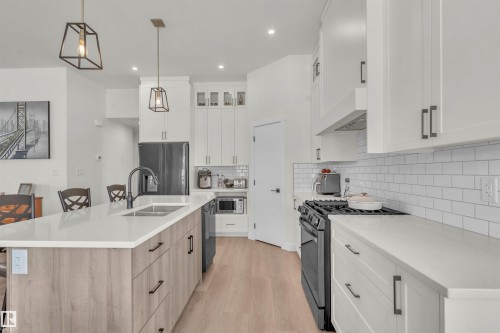 302 Fundy Way, Cold Lake, AB - Indoor Photo Showing Kitchen With Stainless Steel Kitchen With Double Sink With Upgraded Kitchen