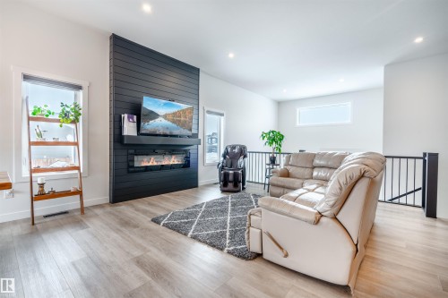 302 Fundy Way, Cold Lake, AB - Indoor Photo Showing Living Room With Fireplace