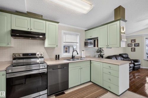 1789 Jubilee Loop, Sherwood Park, AB - Indoor Photo Showing Kitchen With Double Sink