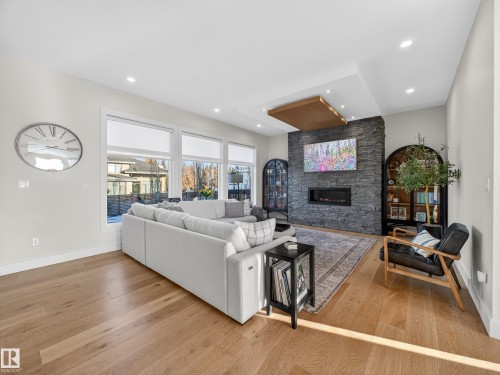 1121 Wahl Place, Edmonton, AB - Indoor Photo Showing Living Room With Fireplace