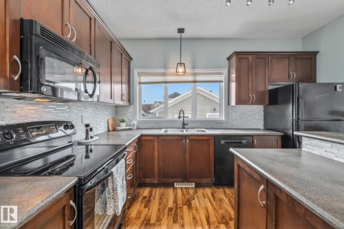 1509 78 St, Edmonton, AB - Indoor Photo Showing Kitchen With Double Sink