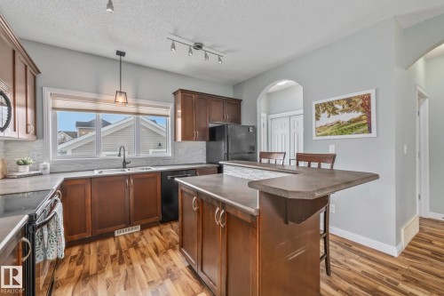 1509 78 St, Edmonton, AB - Indoor Photo Showing Kitchen With Double Sink