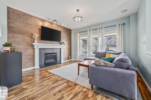 1509 78 St, Edmonton, AB - Indoor Photo Showing Living Room With Fireplace