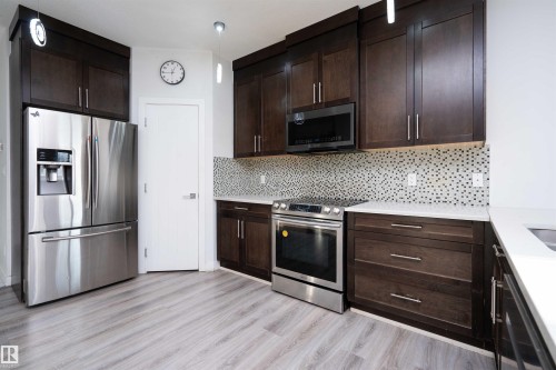 2021 15 Avenue, Edmonton, AB - Indoor Photo Showing Kitchen With Stainless Steel Kitchen With Upgraded Kitchen