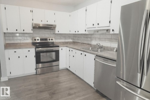 2 10205 158 Avenue, Edmonton, AB - Indoor Photo Showing Kitchen With Stainless Steel Kitchen With Double Sink With Upgraded Kitchen