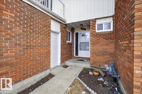 The property features a brick exterior with white trim - 3240 130A Avenue, Edmonton, AB - Outdoor With Exterior