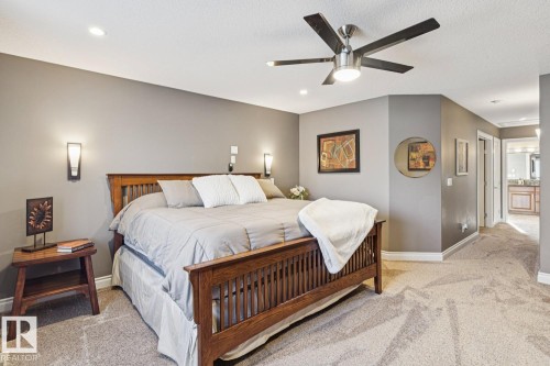 This property features carpeted floors, recessed lighting, and a ceiling fan - 11409 63 Street Nw, Edmonton, AB - Indoor Photo Showing Bedroom