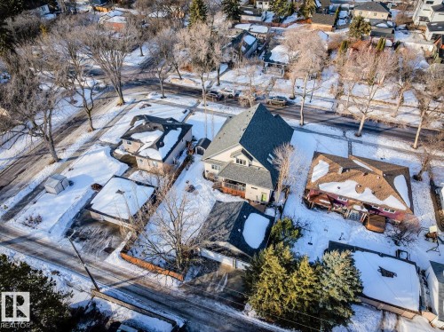 Aerial view showcasing the property's location within a residential area with other structures and surrounding streets - 11409 63 Street Nw, Edmonton, AB - Outdoor With View