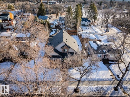 The property features a multi-level design with a prominent dormer window and a dark-colored roof - 11409 63 Street Nw, Edmonton, AB - Outdoor With View