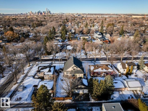 Aerial view highlighting the neighborhood with a skyline visible in the distance - 11409 63 Street Nw, Edmonton, AB - Outdoor With View