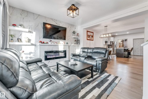 1217 Watt Drive, Edmonton, AB - Indoor Photo Showing Living Room With Fireplace