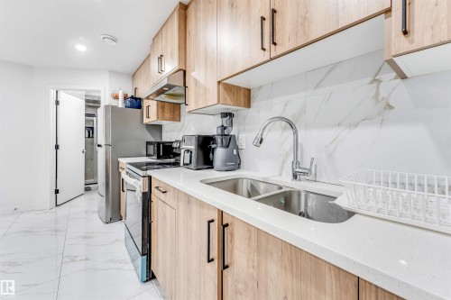 1217 Watt Drive, Edmonton, AB - Indoor Photo Showing Kitchen With Double Sink