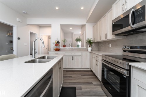 2120 Muckleplum Crescent, Edmonton, AB - Indoor Photo Showing Kitchen With Double Sink With Upgraded Kitchen