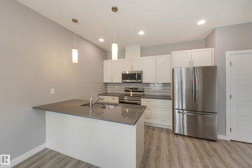 2 12014 92 Street, Edmonton, AB - Indoor Photo Showing Kitchen With Double Sink With Upgraded Kitchen
