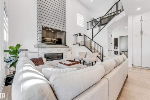 6464 Elston Loop, Edmonton, AB - Indoor Photo Showing Living Room With Fireplace