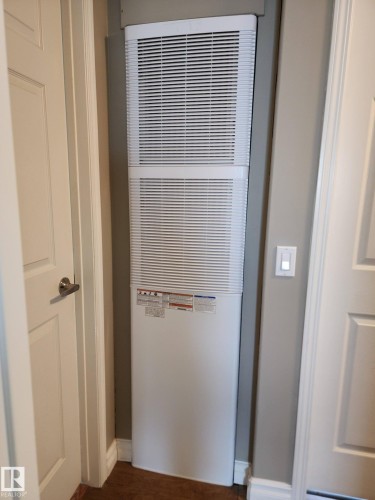 The property features a utility shed with double doors and an additional exterior shed with a single door, both providing practical outdoor storage solutions - 46 Willow Park Estates, Leduc, AB - Outdoor With Exterior