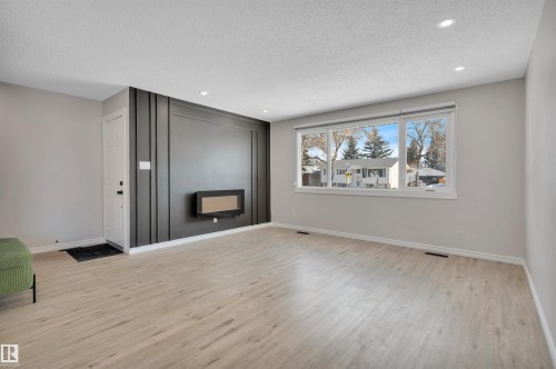 5 Larose Drive, St. Albert, AB - Indoor Photo Showing Living Room With Fireplace