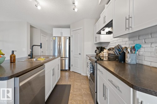 3124 16 Avenue, Edmonton, AB - Indoor Photo Showing Kitchen With Double Sink
