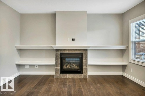 728 43 Avenue, Edmonton, AB - Indoor Photo Showing Other Room With Fireplace