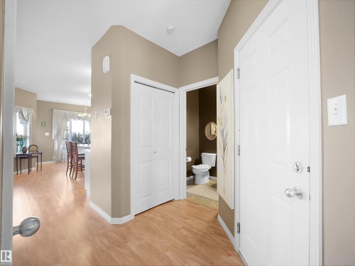Corridor featuring light wood-style flooring and baseboards - 11708 10 Avenue, Edmonton, AB - Indoor Photo Showing Other Room