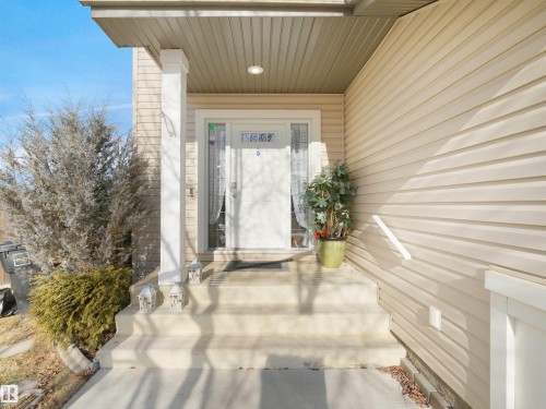 Entrance to property featuring a porch - 11708 10 Avenue, Edmonton, AB - Outdoor With Exterior