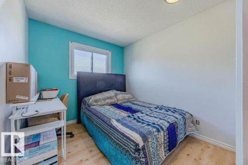 8005 27 Avenue, Edmonton, AB - Indoor Photo Showing Bedroom