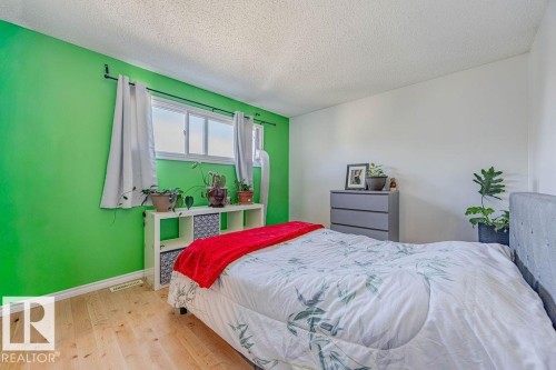 8005 27 Avenue, Edmonton, AB - Indoor Photo Showing Bedroom