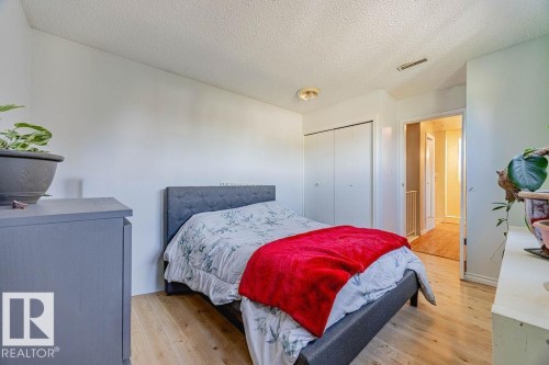 8005 27 Avenue, Edmonton, AB - Indoor Photo Showing Bedroom