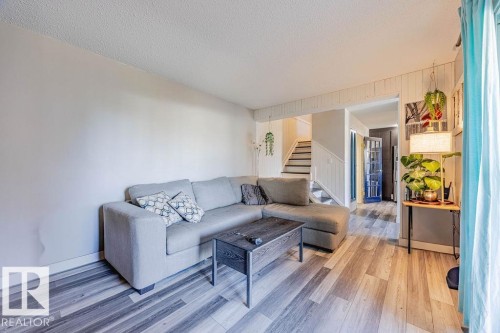 8005 27 Avenue, Edmonton, AB - Indoor Photo Showing Living Room