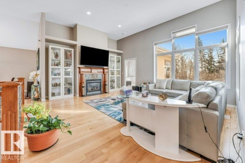 20 18343 Lessard Road, Edmonton, AB - Indoor Photo Showing Living Room With Fireplace