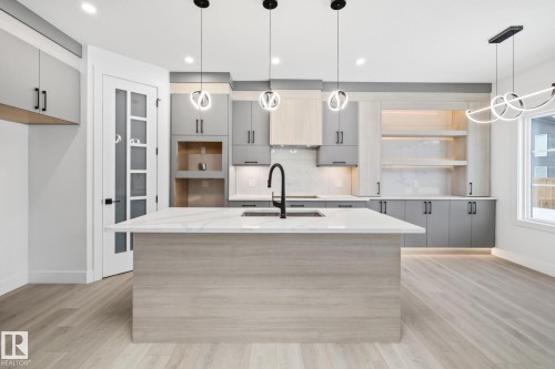 30 Blackbird Bend, Fort Saskatchewan, AB - Indoor Photo Showing Kitchen With Upgraded Kitchen