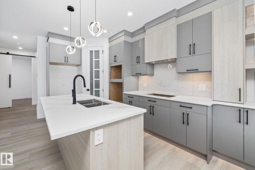 30 Blackbird Bend, Fort Saskatchewan, AB - Indoor Photo Showing Kitchen With Double Sink With Upgraded Kitchen