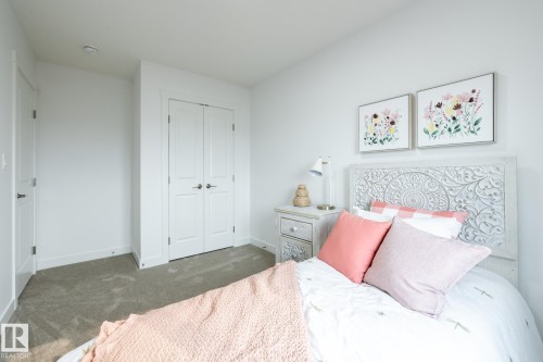 299 Elliott Wynd, Fort Saskatchewan, AB - Indoor Photo Showing Bedroom