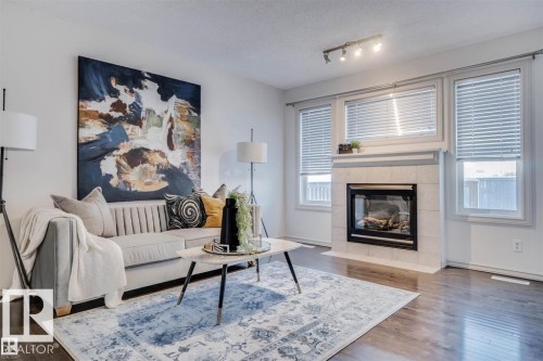 21208 89A Avenue, Edmonton, AB - Indoor Photo Showing Living Room With Fireplace
