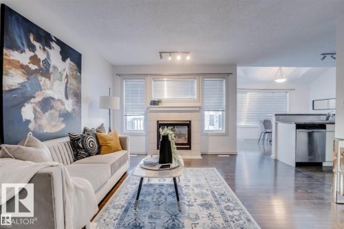 21208 89A Avenue, Edmonton, AB - Indoor Photo Showing Living Room With Fireplace