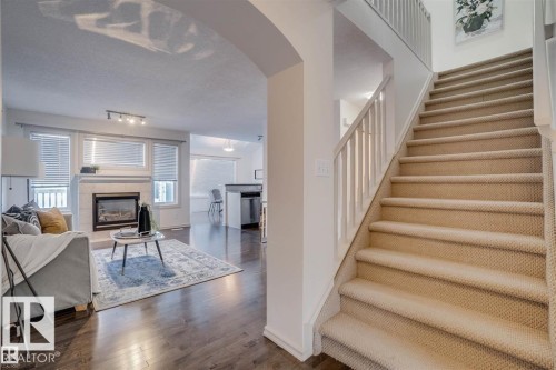 21208 89A Avenue, Edmonton, AB - Indoor Photo Showing Living Room With Fireplace