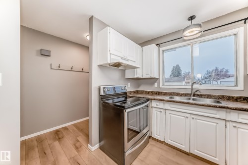 6808 149 Avenue, Edmonton, AB - Indoor Photo Showing Kitchen With Double Sink