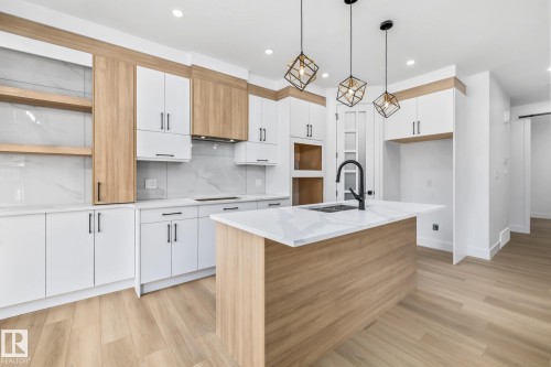 32 Blackbird Bend, Fort Saskatchewan, AB - Indoor Photo Showing Kitchen With Upgraded Kitchen