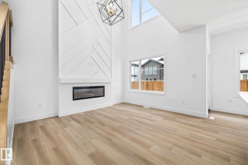 32 Blackbird Bend, Fort Saskatchewan, AB - Indoor Photo Showing Living Room With Fireplace