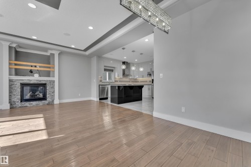 2615 21 Avenue, Edmonton, AB - Indoor Photo Showing Living Room With Fireplace