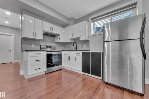 2615 21 Avenue, Edmonton, AB - Indoor Photo Showing Kitchen With Stainless Steel Kitchen With Upgraded Kitchen