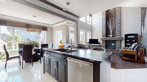 475 Allard Boulevard, Edmonton, AB - Indoor Photo Showing Kitchen With Fireplace With Double Sink