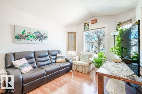 1607 80A Street, Edmonton, AB - Indoor Photo Showing Living Room
